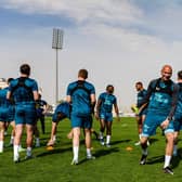 Newcastle United's Jonjo Shelvey and his team-mates warm-up in Riyadh, Saudi Arabia.