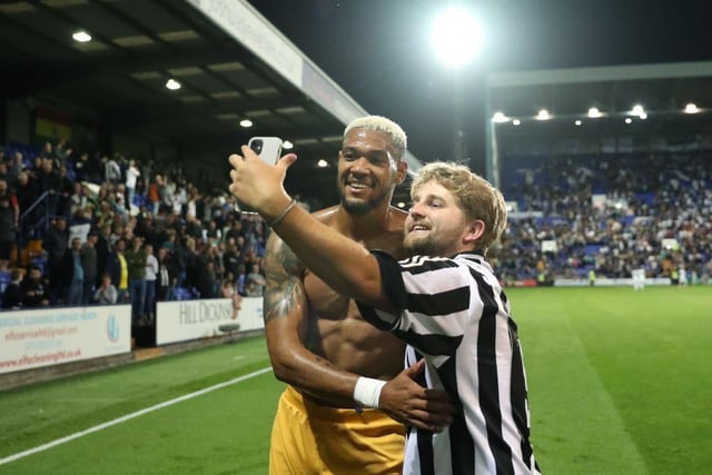 One fan poses for a selfie with Joelinton (Photo by Lewis Storey/Getty Images)