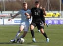 Charlie MacArthur of Scotland vies with Dzenan Pecinovic of Germany during the UEFA Under17 European Championship Qualifier match between Germany U17 and Scotland U17 on March 26, 2022 in Glasgow, Scotland. (Photo by Ian MacNicol/Getty Images)