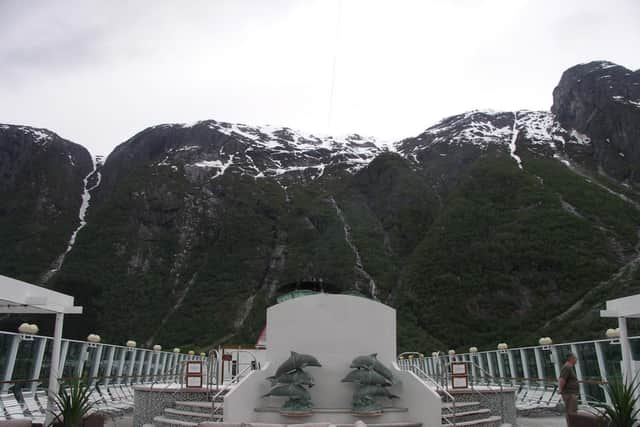 Sailing close to the mountains.