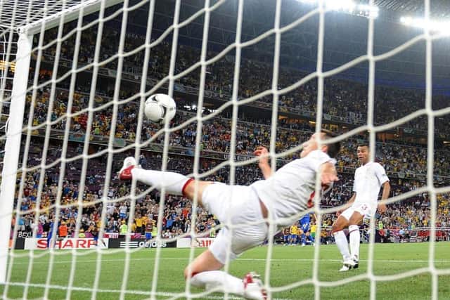 John Terry clears off the live against Ukraine at Euro 2012. Pic: PA.