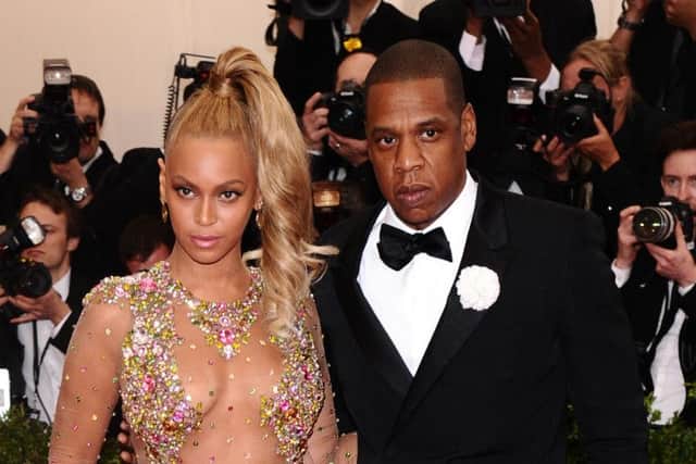 Bey, pictured with hubby Jay Z will appear in the city tomorrow.