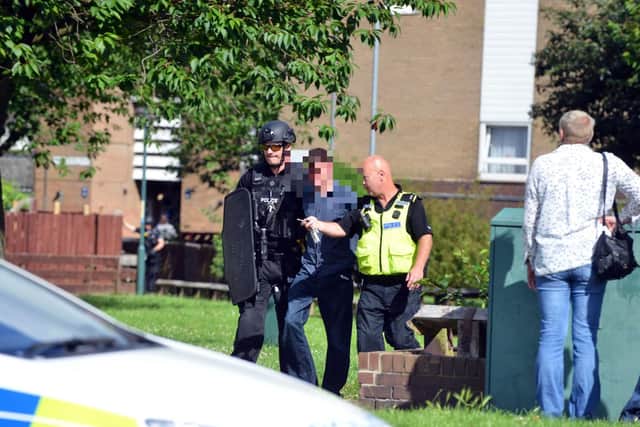 Armed response officers arrest a man in Newmarket Walk, South Shields.
