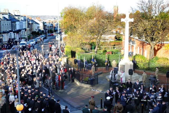 Hundreds of people gathered at the war memorial for a short service. Pic: Craig Leng.