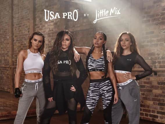 Little Mix try out their own USA Pro range for size.