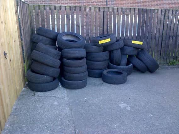 A pile of the tyres left for clear up by the council.