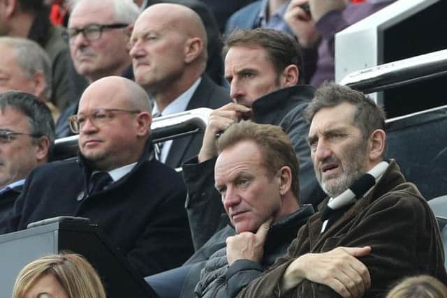 Lee Charnley and Gareth Southgate sat behind Sting and Jimmy Nail