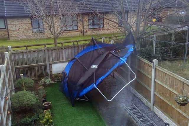 A photo of a trampoline which has been blown away in Leeds. Pic: PA.