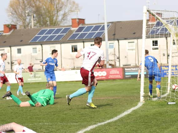 Graeme Armstrong nets the winner for South Shields. Pic: Peter Talbot