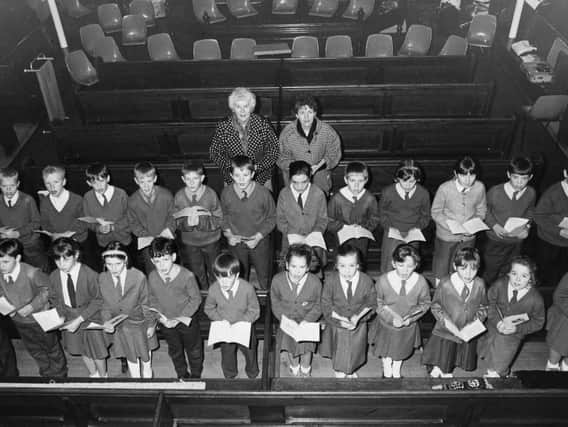 Pupils and staff from St Matthew's Primary School, in Jarrow, prepare for a carol service at Park Road Methodist Church, in Bede Burn Road, in 1991.