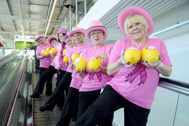 Workers at Asda in South Shields get their breast cancer message across