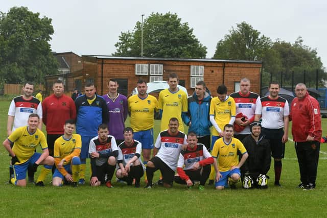 South Tyneside Disability FC staged annual football tournament  with teams from all over UK playing, despite Saturday's adverse weather conditions. South Tyneside FC in white pictured with early opponents New Fordley in Yellow.