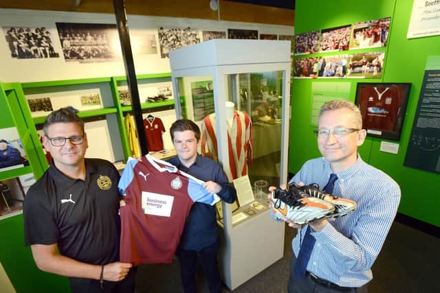More Than A Game football story exhibition at South Shields Museum. From left South Shields FC's David Mitchell and Dan Prince with Museum Manager Geoff Woodward