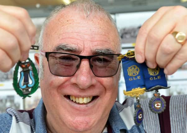 Jarrow Historical Society open's up in The Viking Centre. Historian Norman Graham with medals handed in