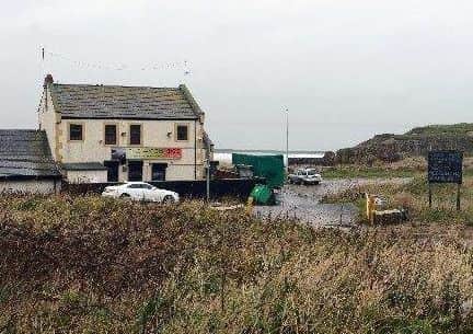The plans would see the Water's Edge pub on the seafront be replaced with flats.