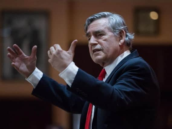 Former Prime Minister Gordon Brown delivers a speech at the E57 Social Club in Birmingham to NHS 70 supporters.