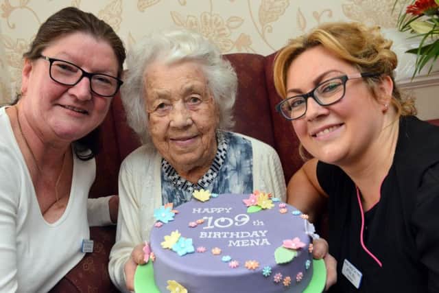 Mena Larkin celebartes her 109th birthday Westoe Grange Home's deputy manager Liz Capewell and home activities Afton Bell (R)