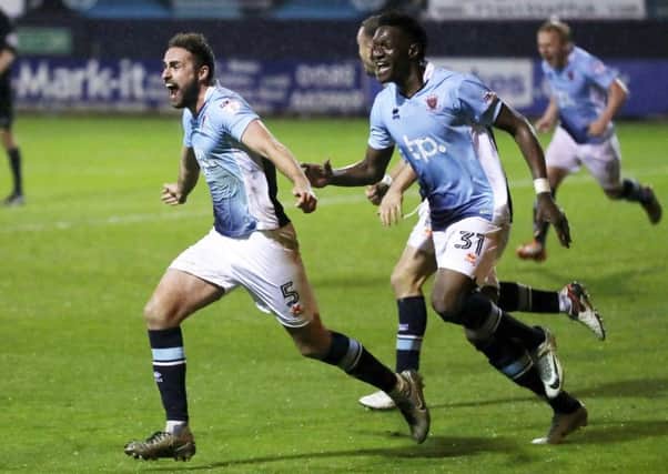 Blackpool's Clark Robertson celebrates the winning goal during the Sky bet League Two play-off second leg match at Kenilworth Road, Luton. PRESS ASSOCIATION Photo. Picture date: Thursday May 18, 2017. See PA story SOCCER Luton. Photo credit should read: Adam Davy/PA Wire. RESTRICTIONS: EDITORIAL USE ONLY No use with unauthorised audio, video, data, fixture lists, club/league logos or "live" services. Online in-match use limited to 75 images, no video emulation. No use in betting, games or single club/league/player publications