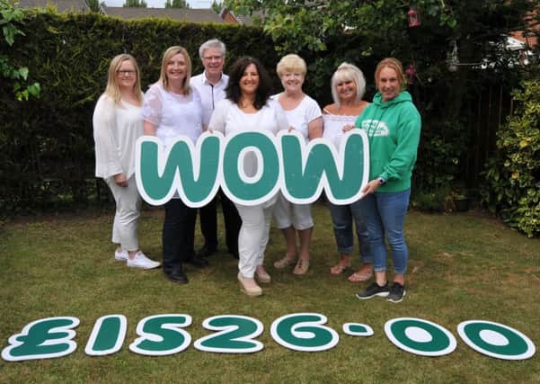 Sara Rutherford and friends heve raised Â£1526 for MacMillan Cancer Care.