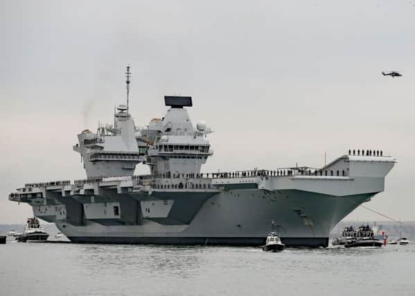 The Royal Navys super-carrier HMS Queen Elizabeth. Picture by Steve Parsons/PA Wire