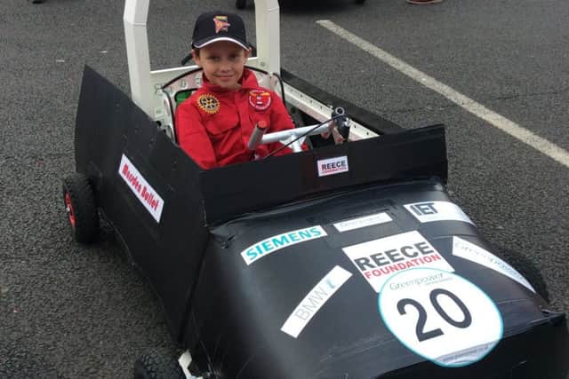 Pupil Josh Taylor in the car.