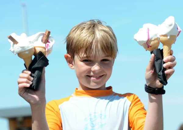 Logan Simpson, 10, enjoys an ice cream recently at South Shields's Sandhaven Beach.
