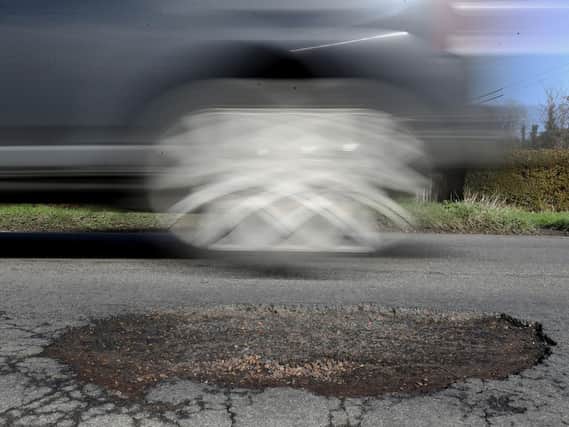 Pothole-related breakdowns have reached a three-year high. Pic: Gareth Fuller/PA Wire.