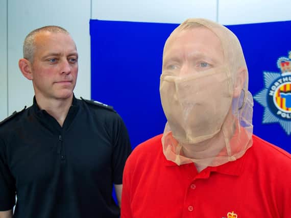 Northumbria Police is issuing officers with new spit guards