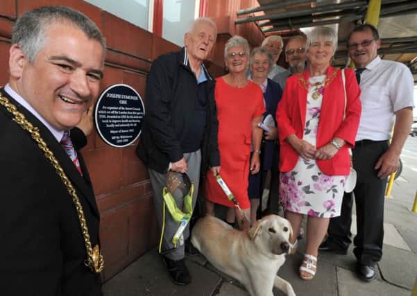 The Mayor Councillor Ken Stephenson and Mayoress Cathy Stephenson, Councillor Stephenson's mother, are pictured with Joseph Symonds surviving children Tom, Josie, Mary, Jim and Vin, as well as poet and playwright Tom Kelly.