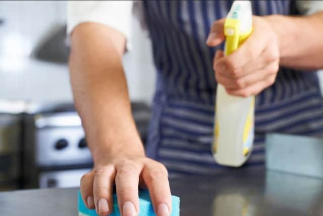 The cleanliness of food preparation surfaces is a factor when determining a business's food hygiene rating.