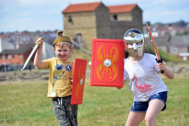 Free summer tours at Arbeia Roman Fort. Brother and sister Ted,4 and Scarlett Reavley, 9.