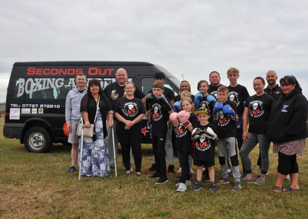Members of Seconds Out Boxing Academy from Ferryhill, with their new minibus, helped by the Together Forever Trust.