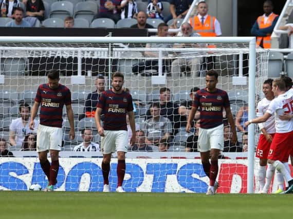 Newcastle's players after Augsburg scored on Saturday.
