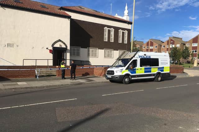 Police at the mosque