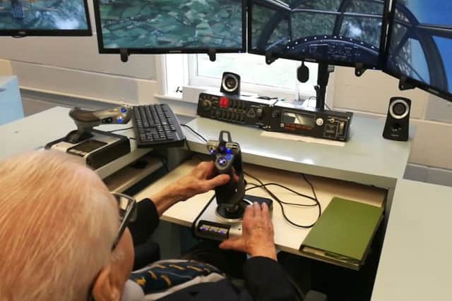 Harold on a flight simulator flying a Wellington bomber