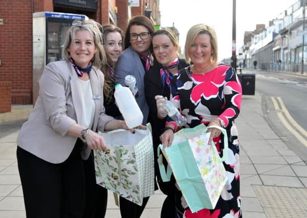 Angela Todd, pictured right, with friends during a litter pick.