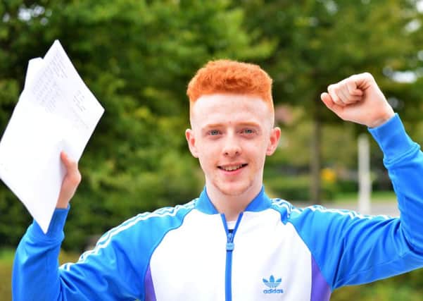St. Joseph's Catholic Academy student Ben Smith receives his A level results.