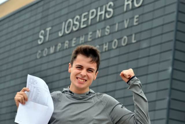 St. Joseph's Catholic Academy student Jack Young receives his A level results.