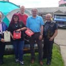 The 4x4 team are presented with defibrillators following a Freemason donation