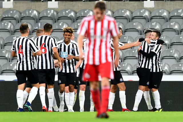 Newcastle's Under-23 players celebrate a goal.
