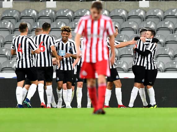 Newcastle's Under-23 players celebrate a goal.