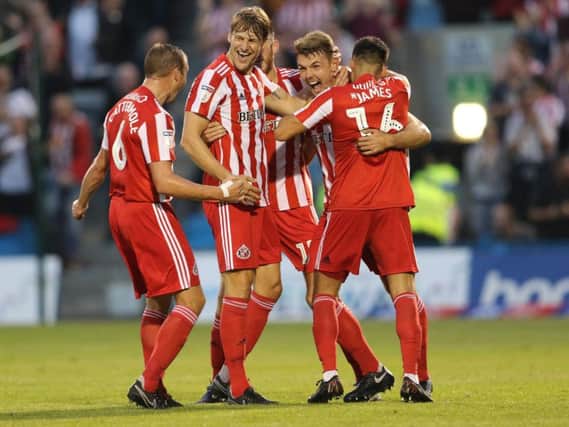 Sunderland players celebrate a goal in the 4-1 win at Gillingham.
