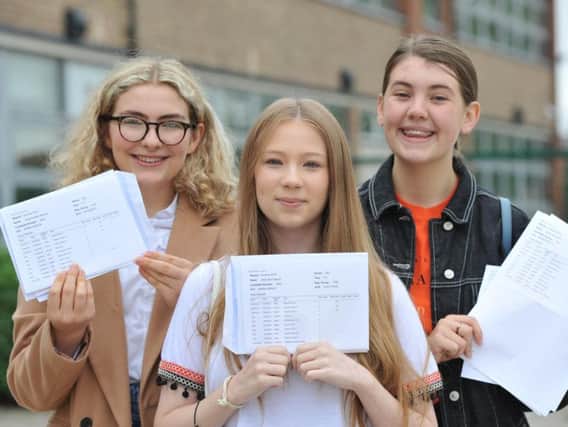 Students Jessica Harrison, Molly Kilgour and Molly Nixon at St Joseph's Catholic Academy, Hebburn, receiving their GCSE results.