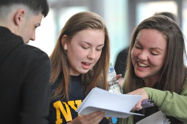 Students at St Joseph's Catholic Academy, Hebburn, receiving their GCSE results.
