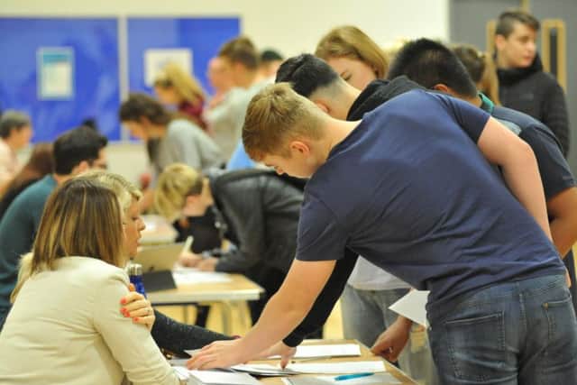 Students at St Joseph's Catholic Academy, Hebburn, receiving their GCSE results.