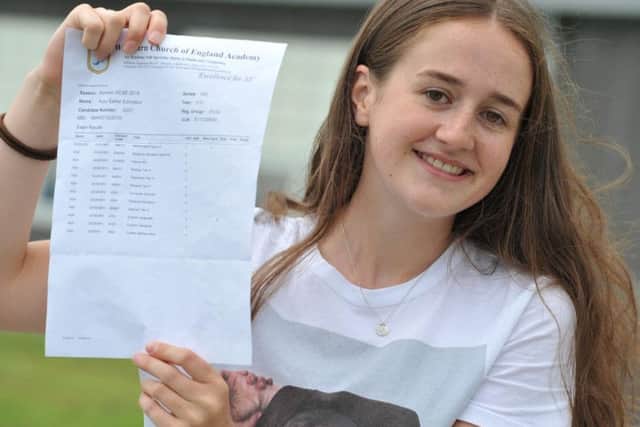 Student Ruby Edmiston at Whitburn Church of England Academy, receiving her GCSE results.