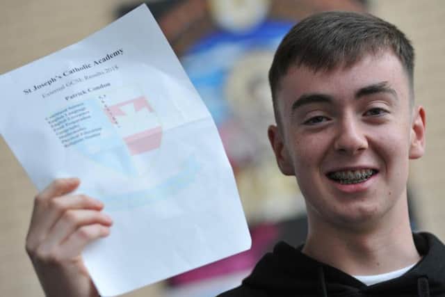 Student Paddy Condon at St Joseph's Catholic Academy, Hebburn, receiving his GCSE results.