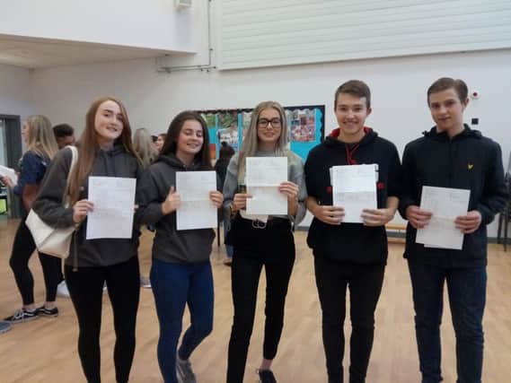 Boldon School pupils celebrate their top results.