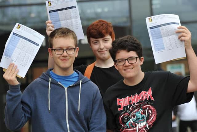 Students Callum Worth, Kieron West and Kristian Healey at Hebburn Comprehensive School, celebrate their GCSE results.