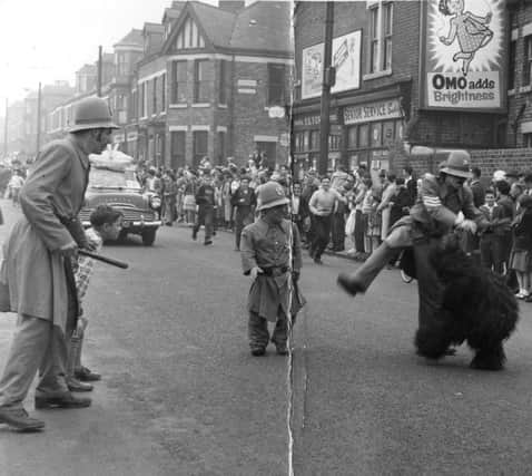 Clowns dressed as keystone cops in Mortimer Road, South Shields.